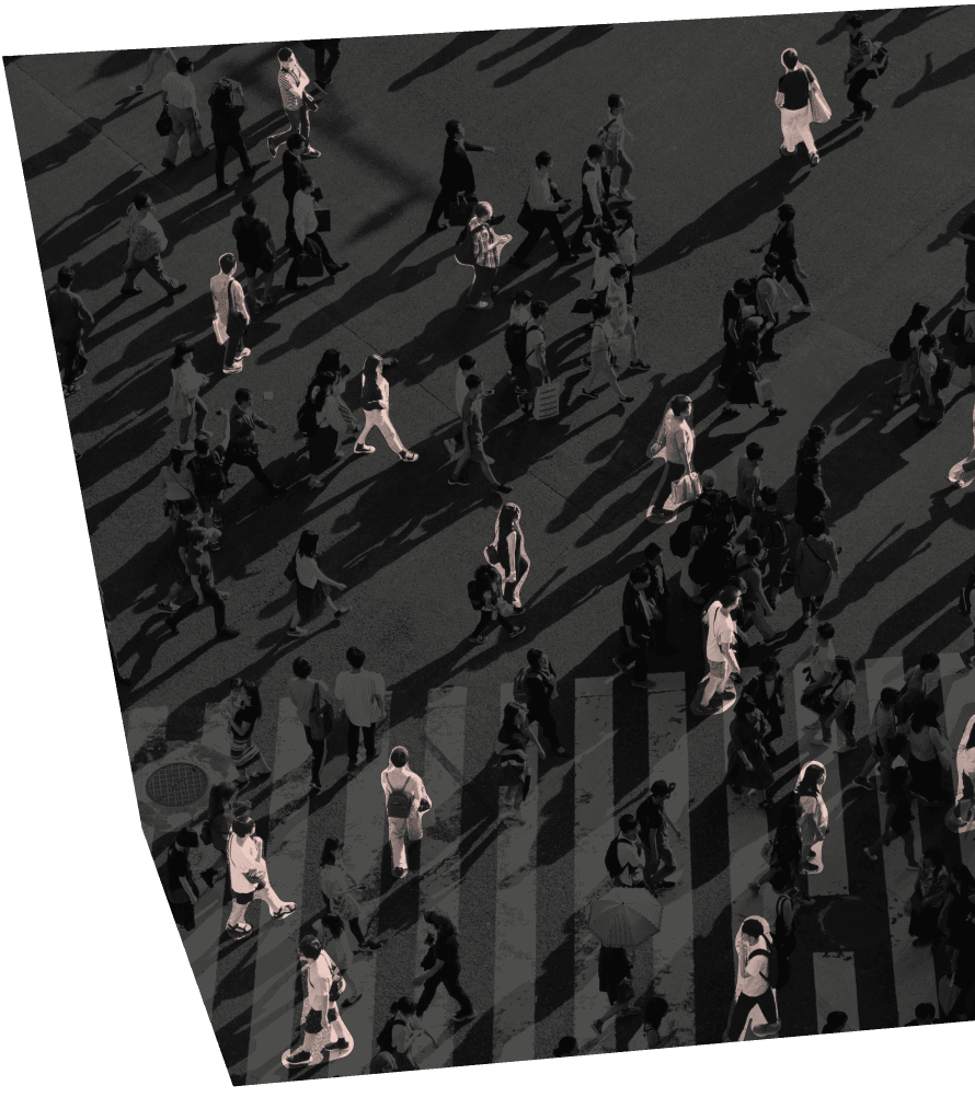 photo of people walking with long shadows following them